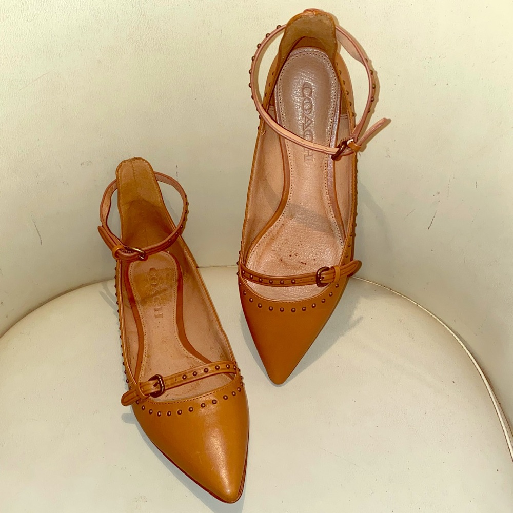 Coach espresso studded flat with ankle strap.